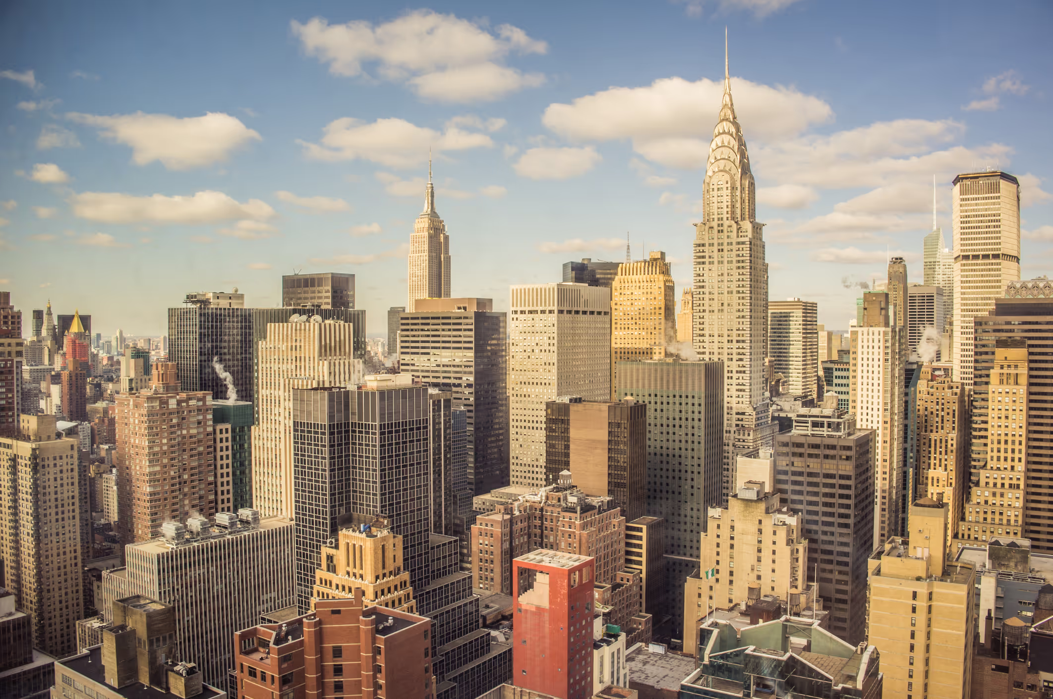 An image of the New York City skyline, with the Chrysler Building in focus.